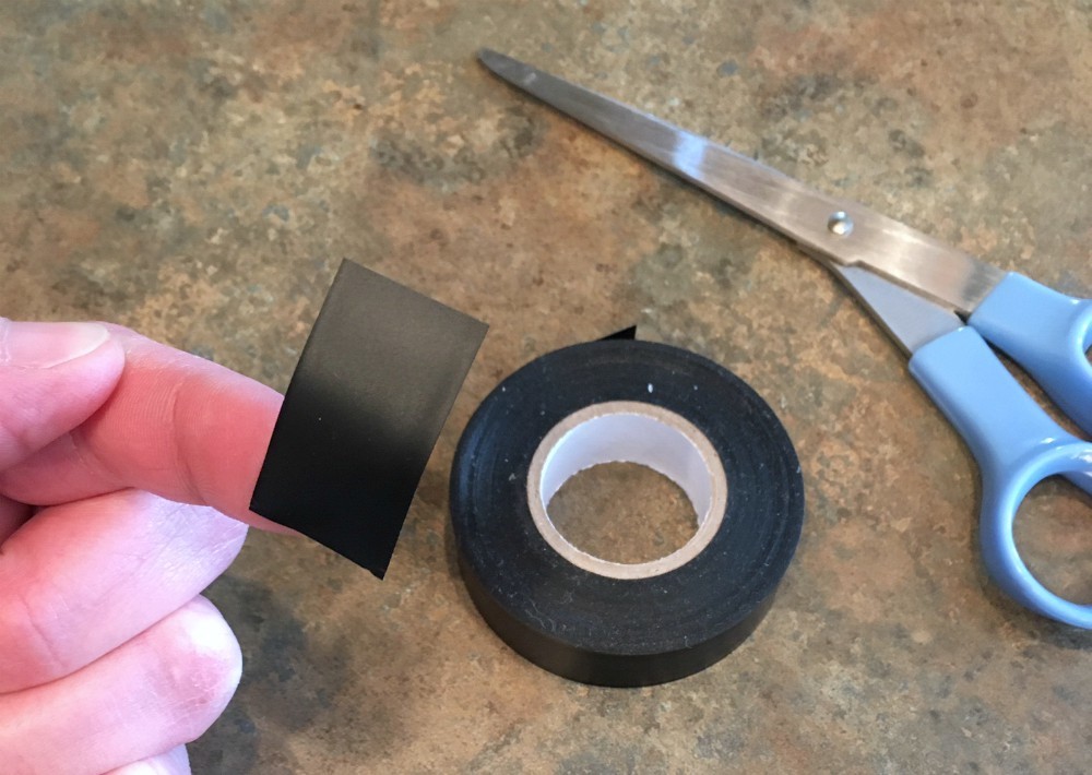 fishing reel spool electrical tape application