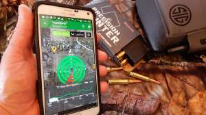 Checking wind direction for a hunting plan photo by mark kayser