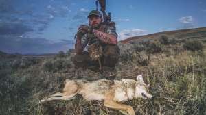 COYOTE Call Shy Steve Criner with coyote after successful calling routine Photo courtesy of Steve Criner