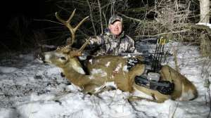Web BW2085 Mark Kayser bowkilled whitetail in wicked weather edt copyright Mark Kayser
