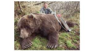 Adams with giant bear