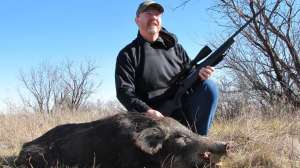 Alan Clemons with west Texas hog shot with Savage Model 110 in 223 first hog killed with this new rifle copy 2