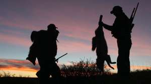 CH213 Successful coyote hunters at the end of the day copyright Mark Kayser