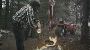 Dan Fitzgerald cooking on treestand platform