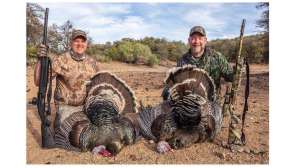 Eric and Derrick with turkeys