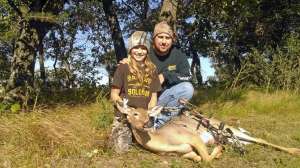 Father and daughter bowhunting
