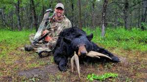 Jeffrey Miller and his black bear
