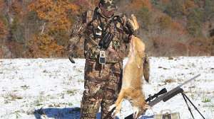 Long Range Predator hunter with coyote photo by Heath Wood