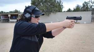 Mossberg MC1sc Hilary Dyer at range