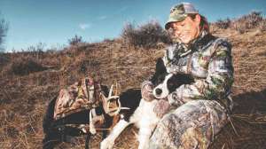 SHA130 Sharon and Sage make sure your dog stays under control if it goes with you shed antler hunting copyright Mark Kayser