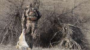 Successful coyote hunting copyright Mark Kayser