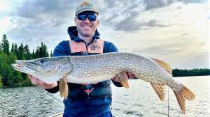 The author with a pike caught on a jig and plastic minnow