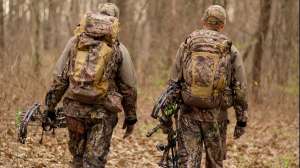 Two bowhunters walking beauty