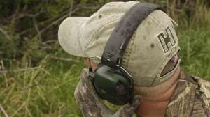 Using hearing protection while calling coyotes copyright Mark Kayser