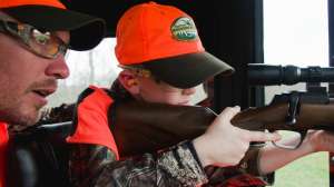 Youth deer hunter with mentor