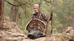 Youth hunter with turkey
