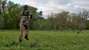 Hunter running after shot turkey