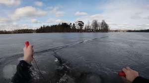 Ice fisherman falls through thin ice