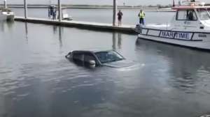 Truck under water boat ramp