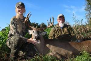 Todd and daugher with big buck