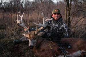 Web Chris Bee with Iowa buck